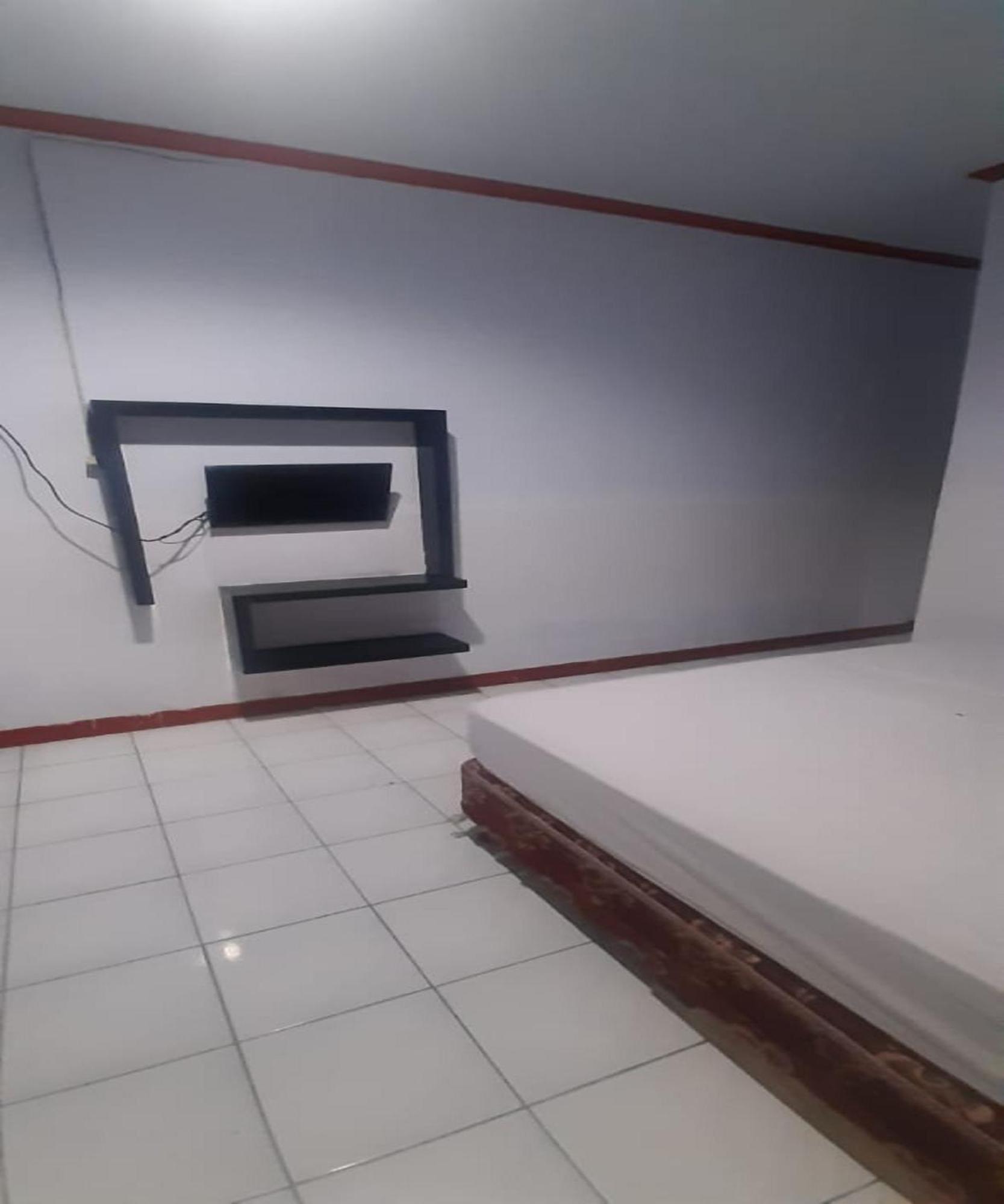 Oyo 93168 Permata Ria Manado